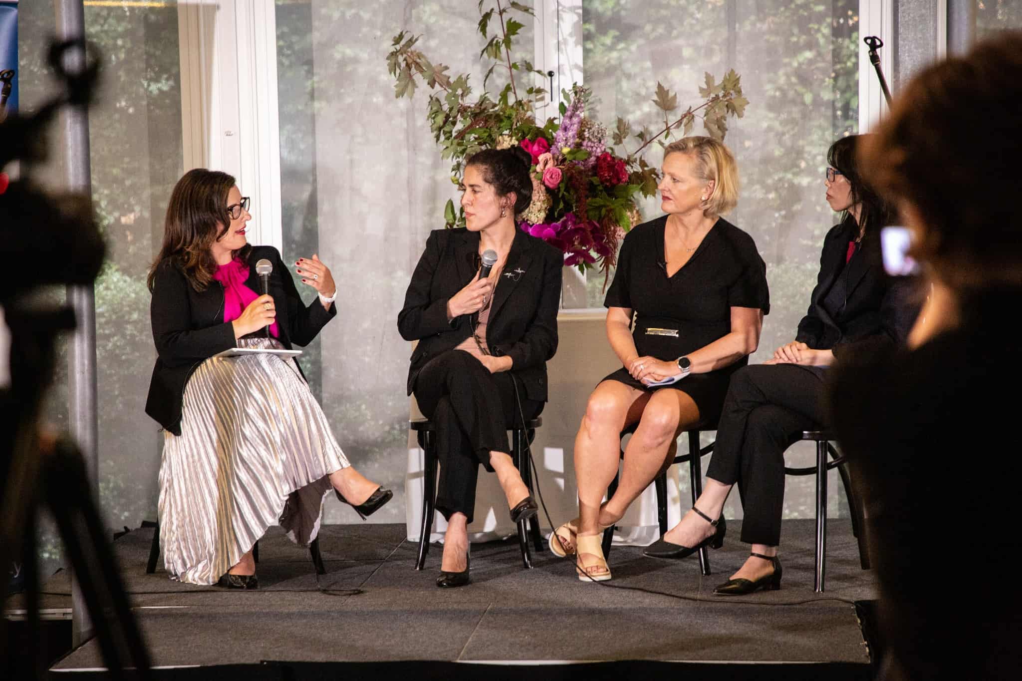 Viv Nguyen, Nola Karapanagiotidis, Corinne Proske and Fotini Kypraios seated on stage at the HACCI International Women's Day panel event, 2022.